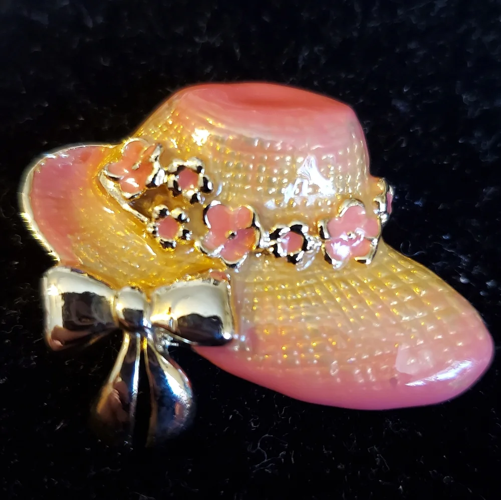 Goldtone and pink enamel hat brooch with bow and flowers